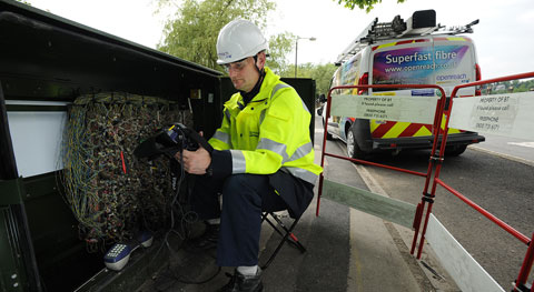 BT engineer upgrading a cabinet for fibre broadband