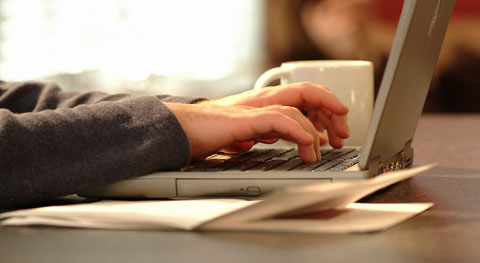 Person typing on a laptop