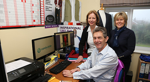 Three people in an office